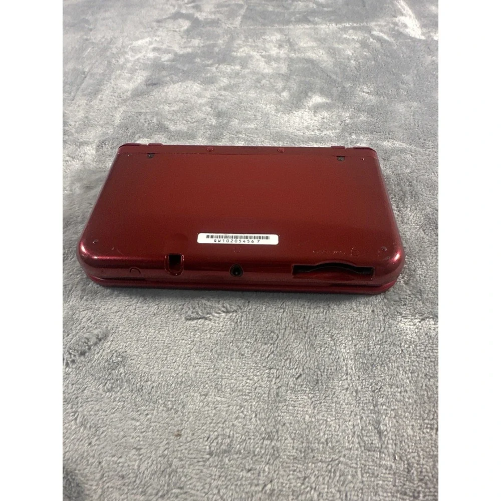 Nintendo New 3DS XL Metallic Red. Stylus and charger NOT included